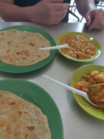 Breakfast time of curry and paratha