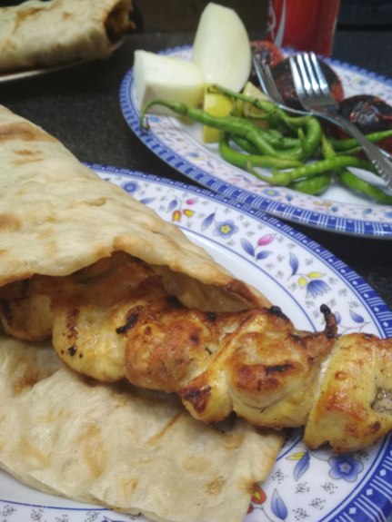 Delicious chicken kebab and fresh bread